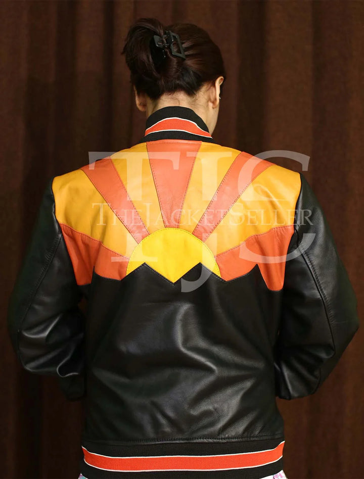 Bold sunrise-inspired leather jacket with orange and yellow sunburst design