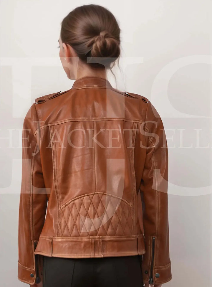 Back view of Women's Genuine Lambskin Leather Jacket with quilted detail and shoulder straps, emphasizing a chic and modern look.