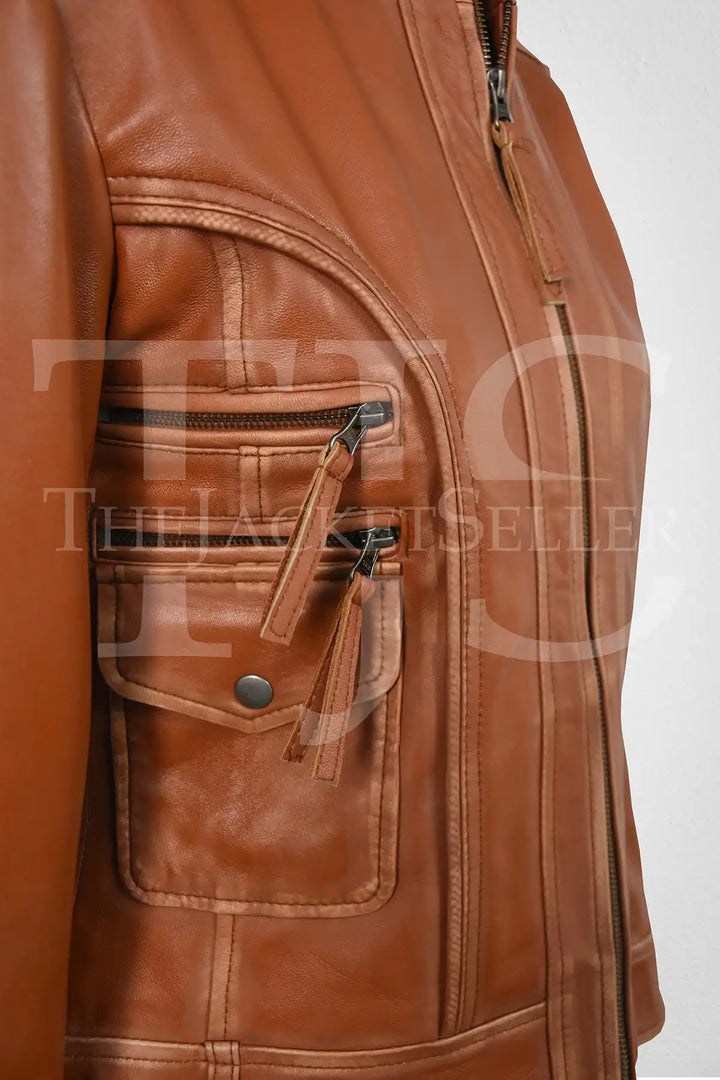 Side view of Women's Genuine Lambskin Leather Jacket, highlighting the sleek fit and functional zippered pockets.