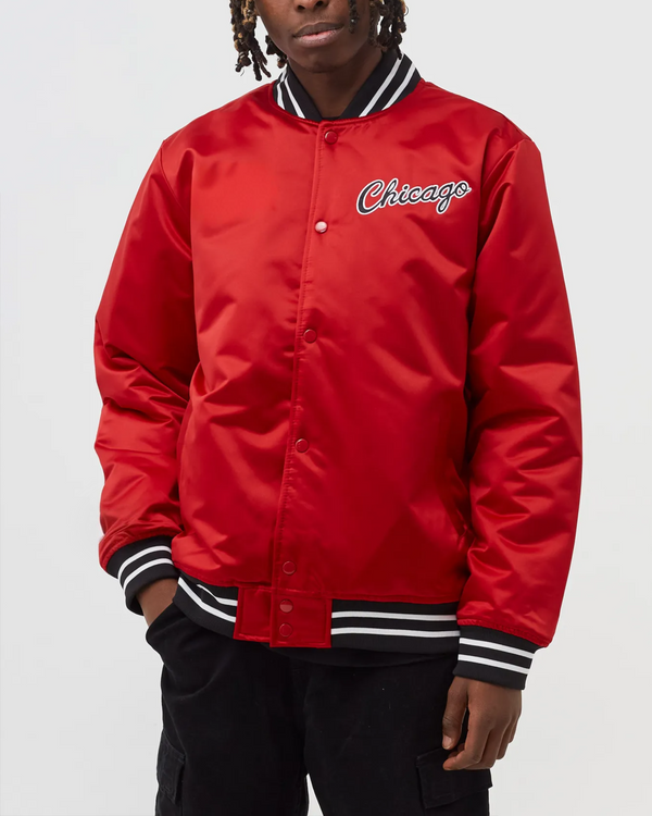 NBA Chicago Bulls satin jacket featuring bold team logo and colors in USA